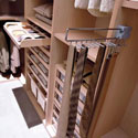 Cabina walk in wardrobe showing pull out racks